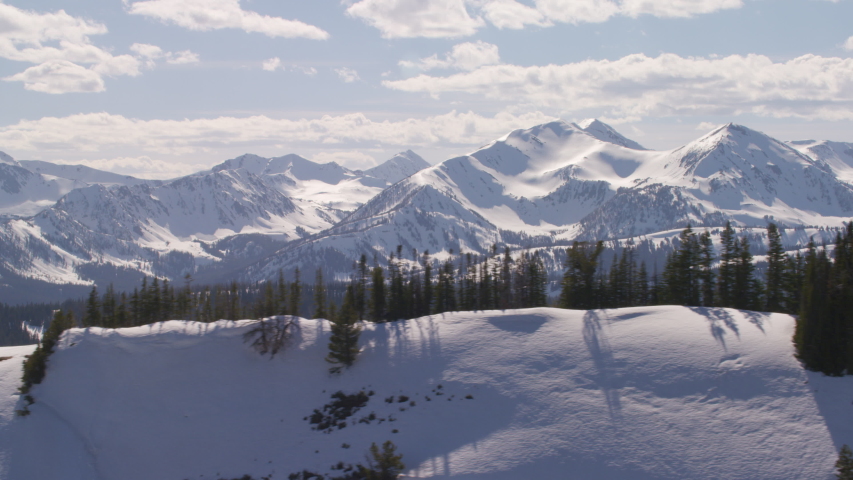 The snowcapped peaks of the Madison mountain Range between Yellowstone National Park and Bozeman, Montana