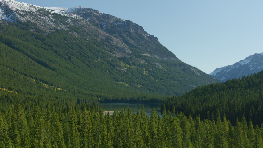 Island Lake, settled in a steep valley in the Beartooth mountain Range, in southwestern Montana