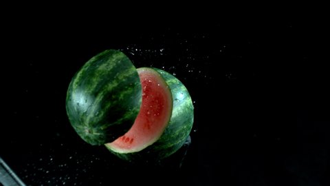 Sword slicing through watermelon in super slow motion. Shot on Phantom Flex 4K camera.