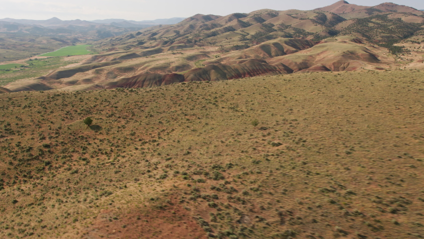 Aerial view of the Painted Hills, located in Wheeler County, Oregon. Shot from helicopter with Cineflex gimbal and RED 8K camera.