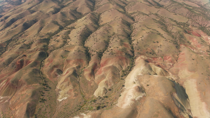 Aerial view of the Painted Hills, located in Wheeler County, Oregon. Shot from helicopter with Cineflex gimbal and RED 8K camera.