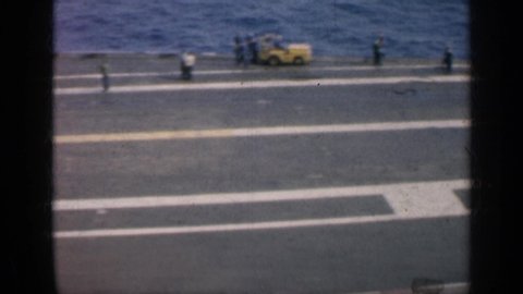 CUBA-1962: Sweeping View From The Top Of A Jet Carrier With Workers And Equipment Present