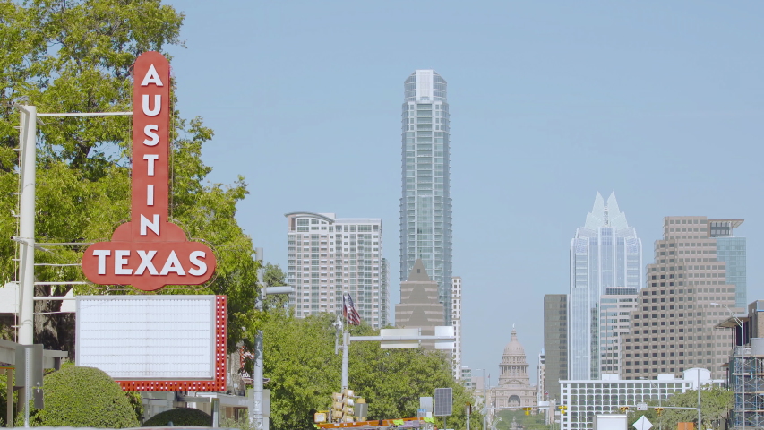 Austin Texas sign with blank marquee in front of city skyline on sunny day Royalty-Free Stock Footage #1047662182