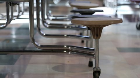 School Cafeteria Rack Focus Across Empty Chairs