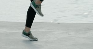 Woman doing jogging on the spot leg exercises