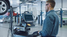 Car Service Manager or Mechanic is Running an Interactive Diagnostics Software on an Advanced Computer. Specialist Inspecting the Vehicle in Order to Find Broken Components and Errors in Data Logs. - Powered by Shutterstock - Get 15% off with code: PIKWIZARD15