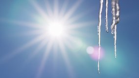 Bright rays of sunlight thaw icicles into dripping water in the warm spring sun in this cinematic shot with lens flare and a clear blue sky. - Powered by Shutterstock - Get 15% off with code: PIKWIZARD15