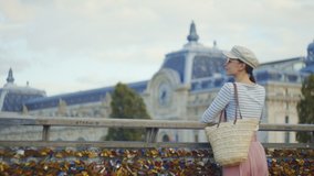 Young tourist on a bridge in Paris