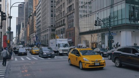 NEW YORK CITY - SEPTEMBER 2016: Panoramic shot of vehicle traffic at Fifth Avenue and East 42nd Street                in New York City, USA