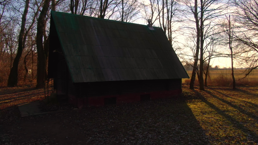 Abandoned Cottage In a Forest Next to A Farming Field During an Autumn Evening With a Sunset in Zalesie, Near Bratislava, Slovakia