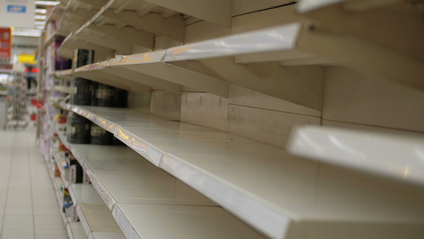 Empty shelves in store. Supermarket with empty shelves for goods Royalty-Free Stock Footage #1047816214