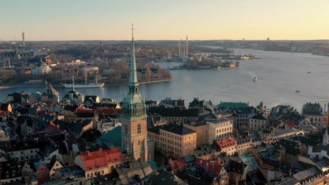 STOCKHOLM, SWEDEN - FEBRUARY, 2020: Aerial view of Stockholm city centre Gamla stan. Flying over buildings in old town.