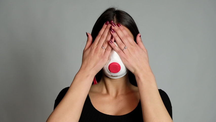 girl scared from coronavirus with mask