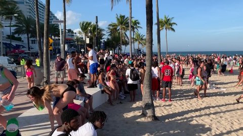 FORT LAUDERDALE, FLORIDA, USA:  College students on spring break enjoying hanging out and socializing with each other as seen on March 5, 2020.