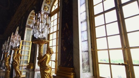 VERSAILLES, PARIS, FRANCE- February 12, 2020: Hall of Mirrors, Palace of Versailles, Paris. Popular tourists attraction. Famous royal history landmark. 