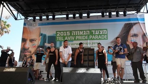 TEL AVIV, ISRAEL - JUNE 12, 2015: Nadav Guedj performs 'Golden Boy', Eurovision Song Contest 2015 Second Semi-Final (IBA), during the Gay Pride Parade Festival in Tel Aviv.