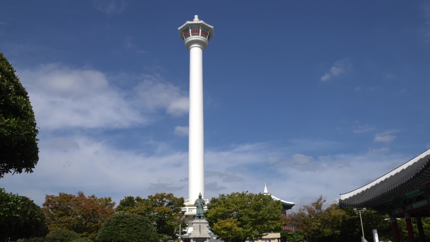 Busan tower and statue of admiral yi sun-sin in yongdusan park