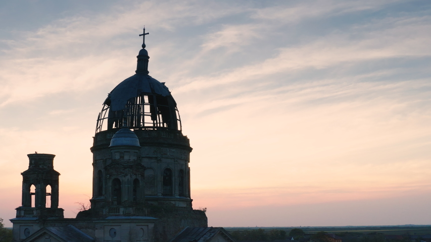 Romania – Circa 2020: Old abandoned Catholic Church at countryside near Timisoara.