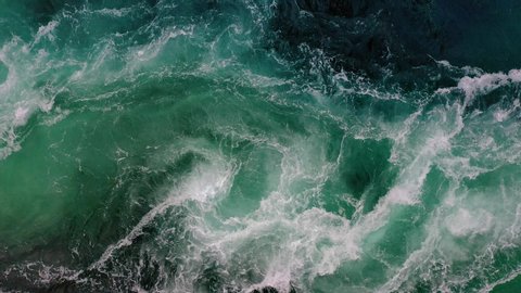 Waves of water of the river and the sea meet each other during high tide and low tide. Whirlpools of the maelstrom of Saltstraumen, Nordland, Norway Stock Video