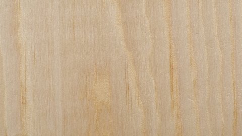 Wooden board surface close up tracking. Wood texture. Slider shot. Top view, macro. 4K