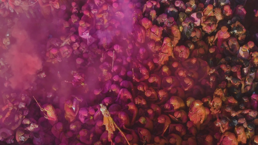 Color battle at the holi festival in India, 4k aerial shot Royalty-Free Stock Footage #1047909766