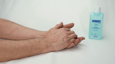 Cologne, NRW/Deutschland - March 8 2020
Hands Getting Sanitized On White Background
