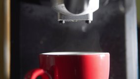 Footage B Roll of Pouring coffee stream from machine in cup. Home making hot Espresso. Using filter holder. Flowing fresh ground coffee. Drinking roasted black coffee in the morning. 