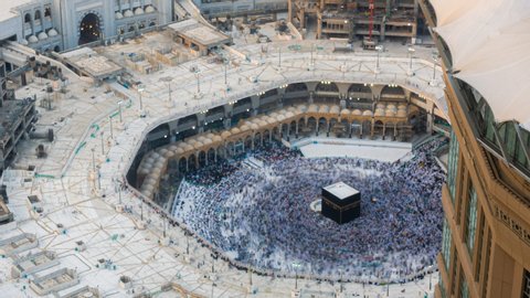 Kaaba Time lapse sunset of Muslim pilgrims circling around the holy Kaaba at day and praying inside al Masjid al Haram in Mecca, Saudi Arabia. Prores 4K