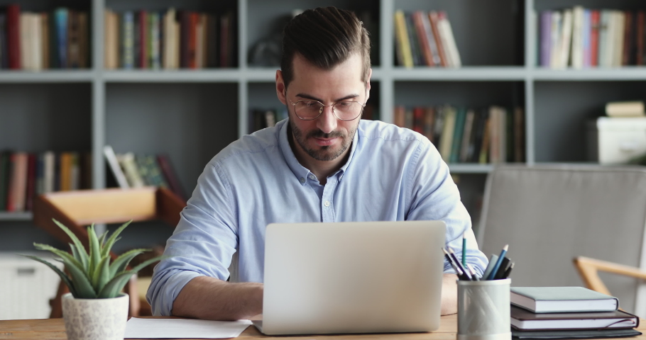 Business concept of 4k Resolution. The employee is looking at the ...