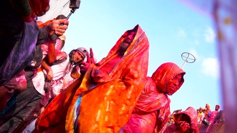 transgender holi in Mathura holi festival. People dancing and playing holi in nand gaon, Uttar Pradesh/ India - March 5 2020