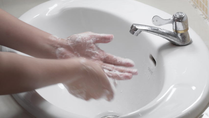 Close up of female lathering hands with soap before washing 
 Royalty-Free Stock Footage #1047983275