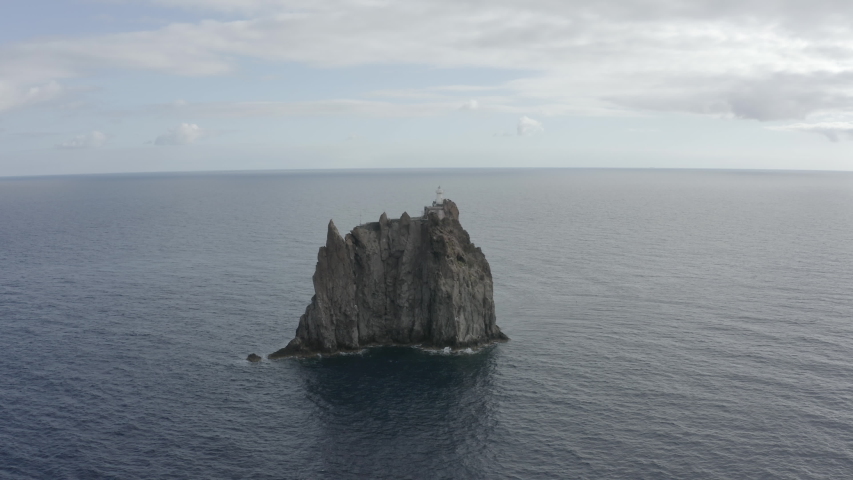 Drone Flight Rock Island with Lighthouse