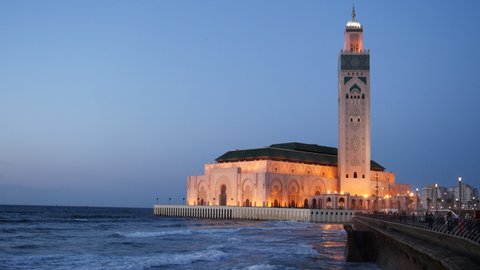 dusk view of hassan ii mosque and the seawall in casablanca, morroco