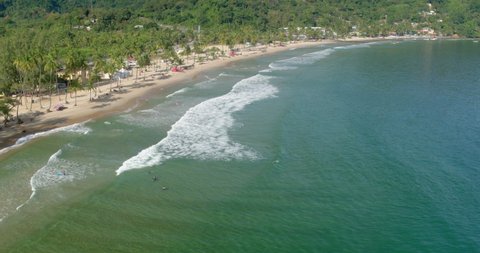 Aerial view of the sunny Maracas Beach in Trinidad. View the rich green water of the island.