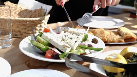 Greek salad and saganaki in Taverna