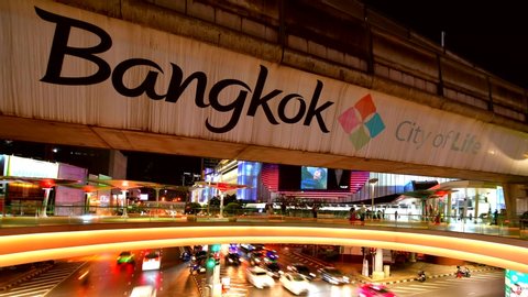 Bangkok, Thialand - MARCH 9,2020: Time lapse traffic sky walk area connects Siam Discovery department store and MBK Center over the Pathumwan Intersection in bangkok