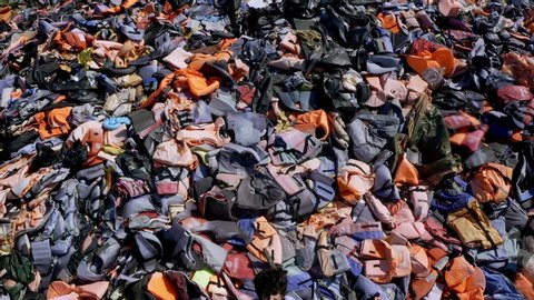 Aerial drone of Graveyard of lifejackets of hundreds of thousands refugees in Molyvos Greece, Lesvos
