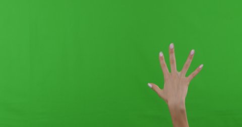 Set of different female hand grab and put gestures fast and slow, green chroma key background