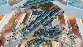 Time lapse crowded people in shopping mall. Escalators in modern shopping mall. - Powered by Shutterstock - Get 15% off with code: PIKWIZARD15