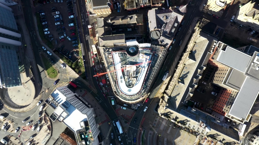 Leeds UK, 13th Feb 2020: Aerial footage of renovation work being done on The Majestic building located in the town centre of Leeds in West Yorkshire in the UK, soon to be Channel 4 headquarters | Shutterstock HD Video #1048108552