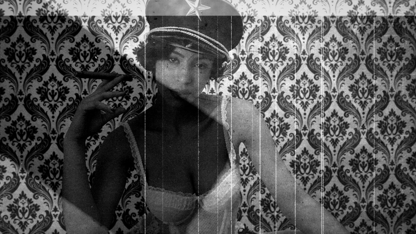 Scratched vintage celluloid film of a young woman wearing a captain