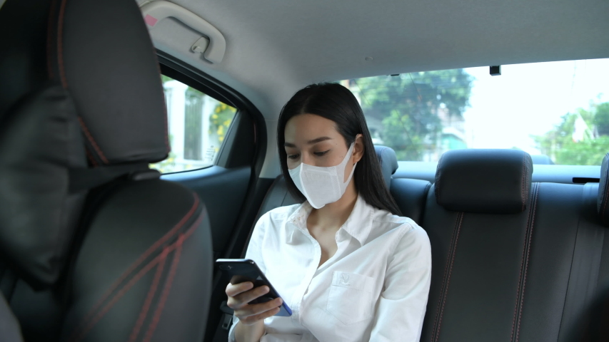 Travel Concept. The masked woman is traveling to the doctor at the hospital. 4k Resolution. | Shutterstock HD Video #1048169503