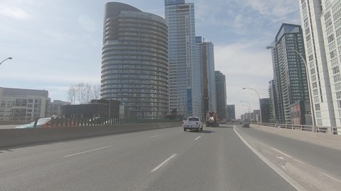 Toronto, Ontario, Canada March 2020 Toronto city downtown skyline driving POV