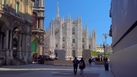 Milan, Italy - March 11, 2020: Empty square in front of the Duomo Cathedral. Panic from the Chinese viral corona Covid 19 in Italy. Empty streets. Quarantine in Milan. Pandemic. Red zone. Medecine 