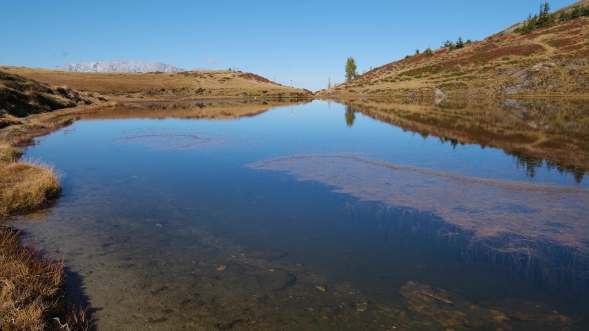 autumn alpine kleiner paarsee paarseen lake Stock Footage Video (100% ...