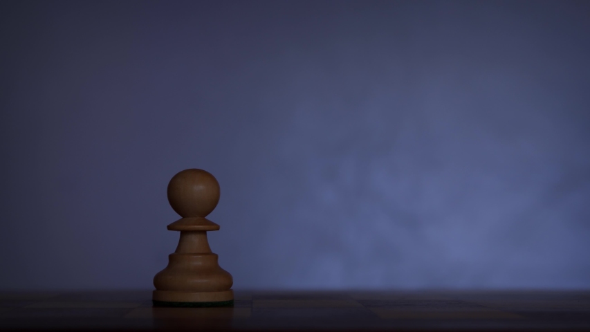 Megalomania. The pawn feels like a king. Chess concept. 4k video