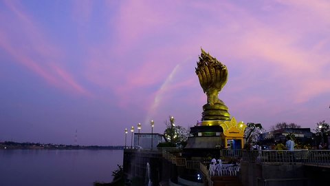 NAKHON PHANOM, THAILAND - MARCH 8 : Yard serpent spits water on the Mekong River in Nakhon Phanom, Thailand for foreign traveler and thai people travel visit and respect praying on March 8, 2020 in Na