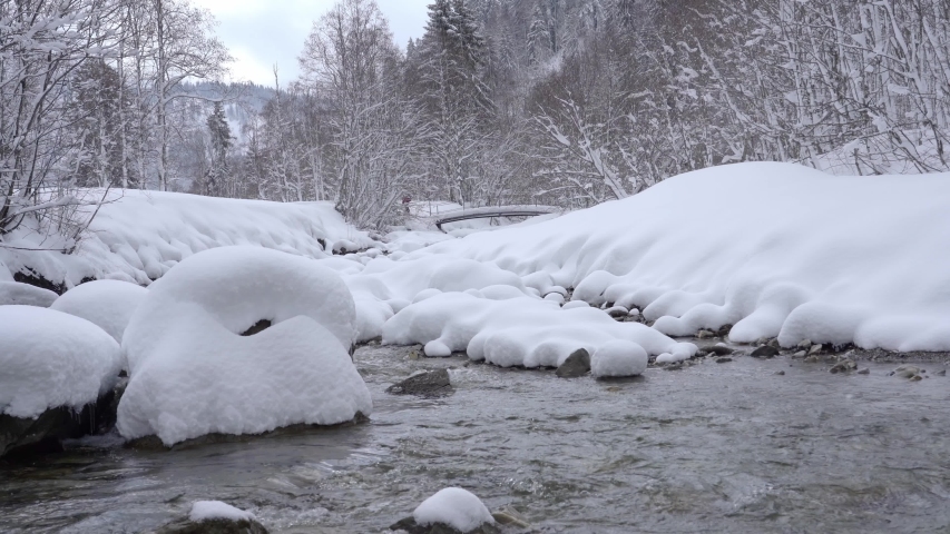 mountain cree with fresh fallen snow an clean water in the Allgäu Alps near Oberstdorf, Bavaria, Germany