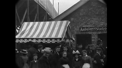 CIRCA 1902 - A fair is set up in an urban area of Hull, England.