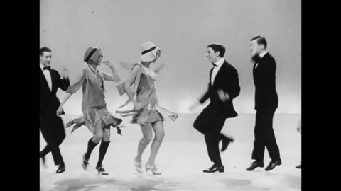 CIRCA 1950s - A 1950s dance troupe reimagines the Charleston dance of the 1920s on a broadway stage.